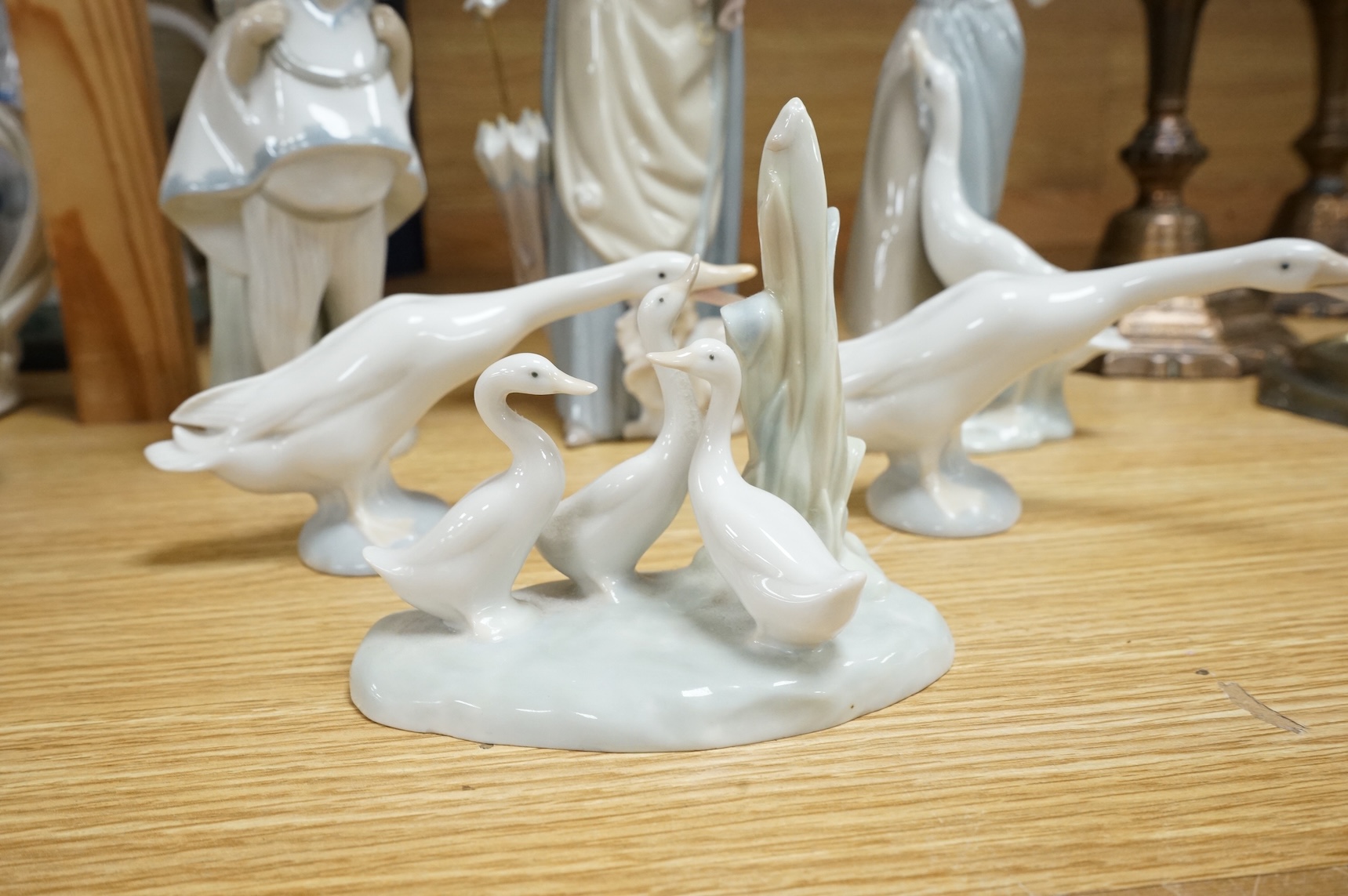 Five Lladro figures and one other, tallest 37cm high